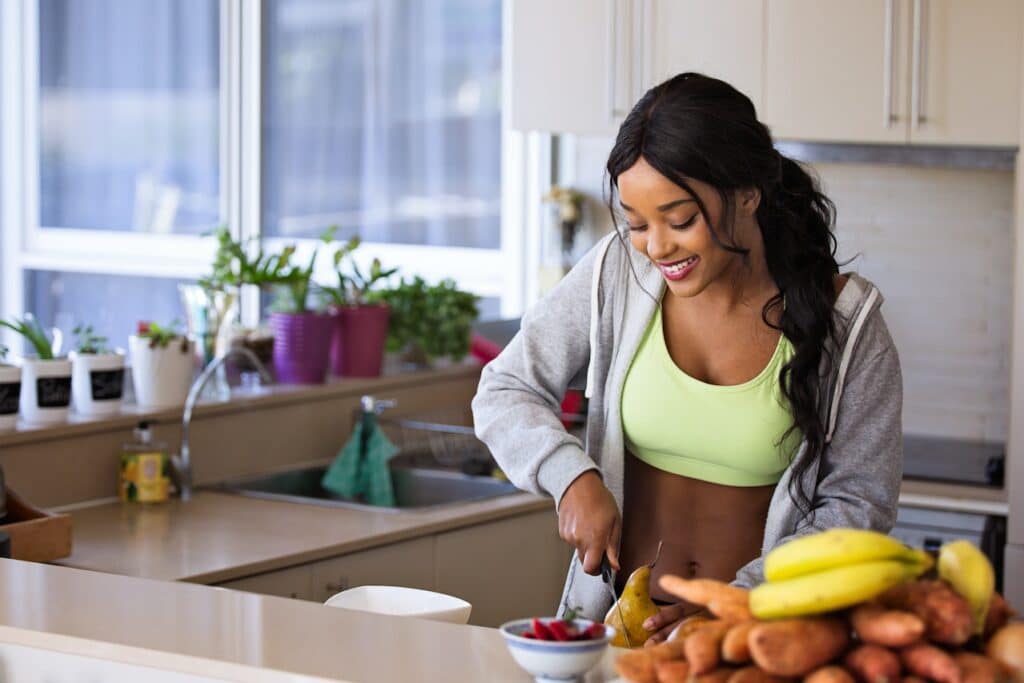 A young woman prepares a snack