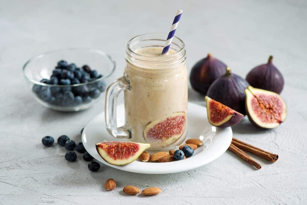 A healthy smoothie and fruit make a wonderful breakfast